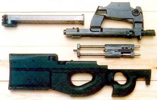 П б 90. FN p90 в разборе. Автоматика p90. Разборка FN P-90. Подача патрона p90.