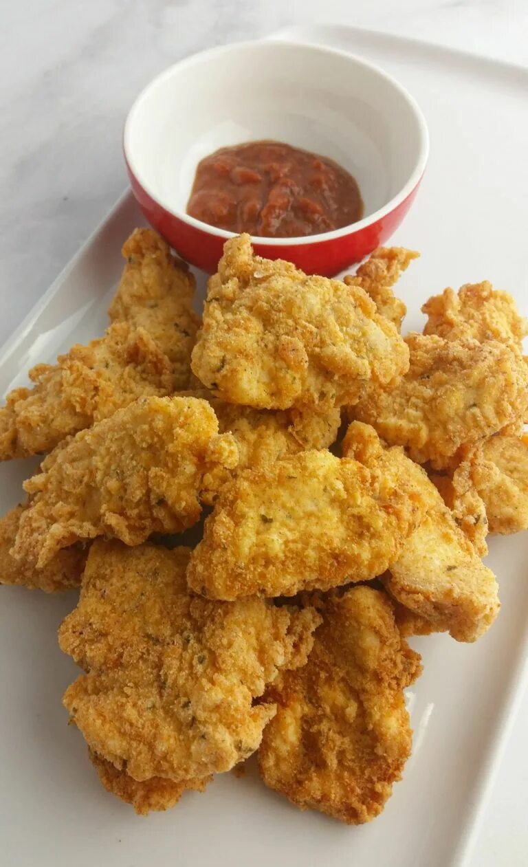 Наггетсы как в kfc. Наггетсы кфс. наггетсы куриные кфс. кфс чикен наггетсы. nuggets курица kfc.