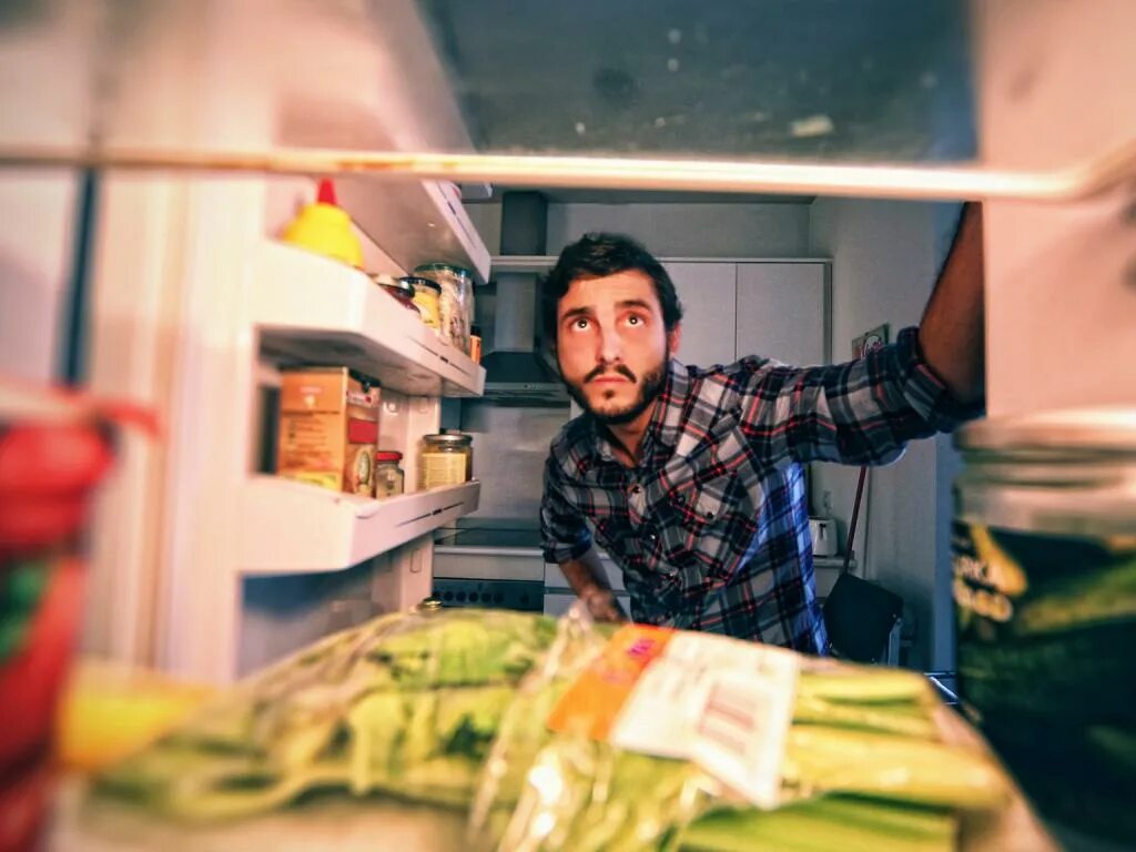 Next to the fridge