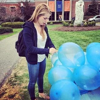 Girl pop balloons