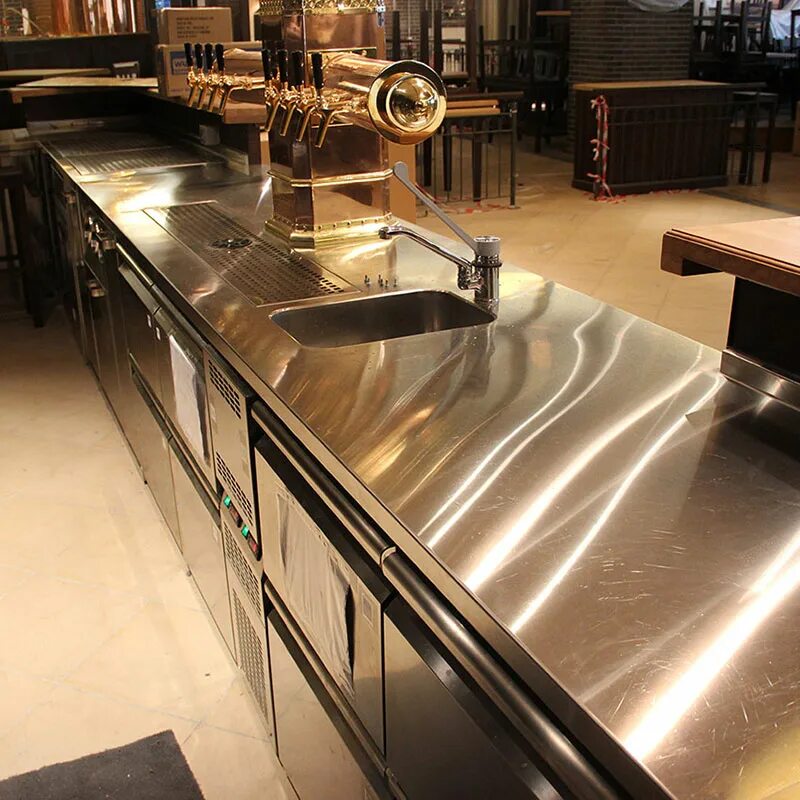 Полностью из нержавеющей стали. Кухонные фасады из нержавейки. Стол нерж 2000х1000х8500. Ограждение лестницы нержавейка. Изделия из трубы нержавейки.