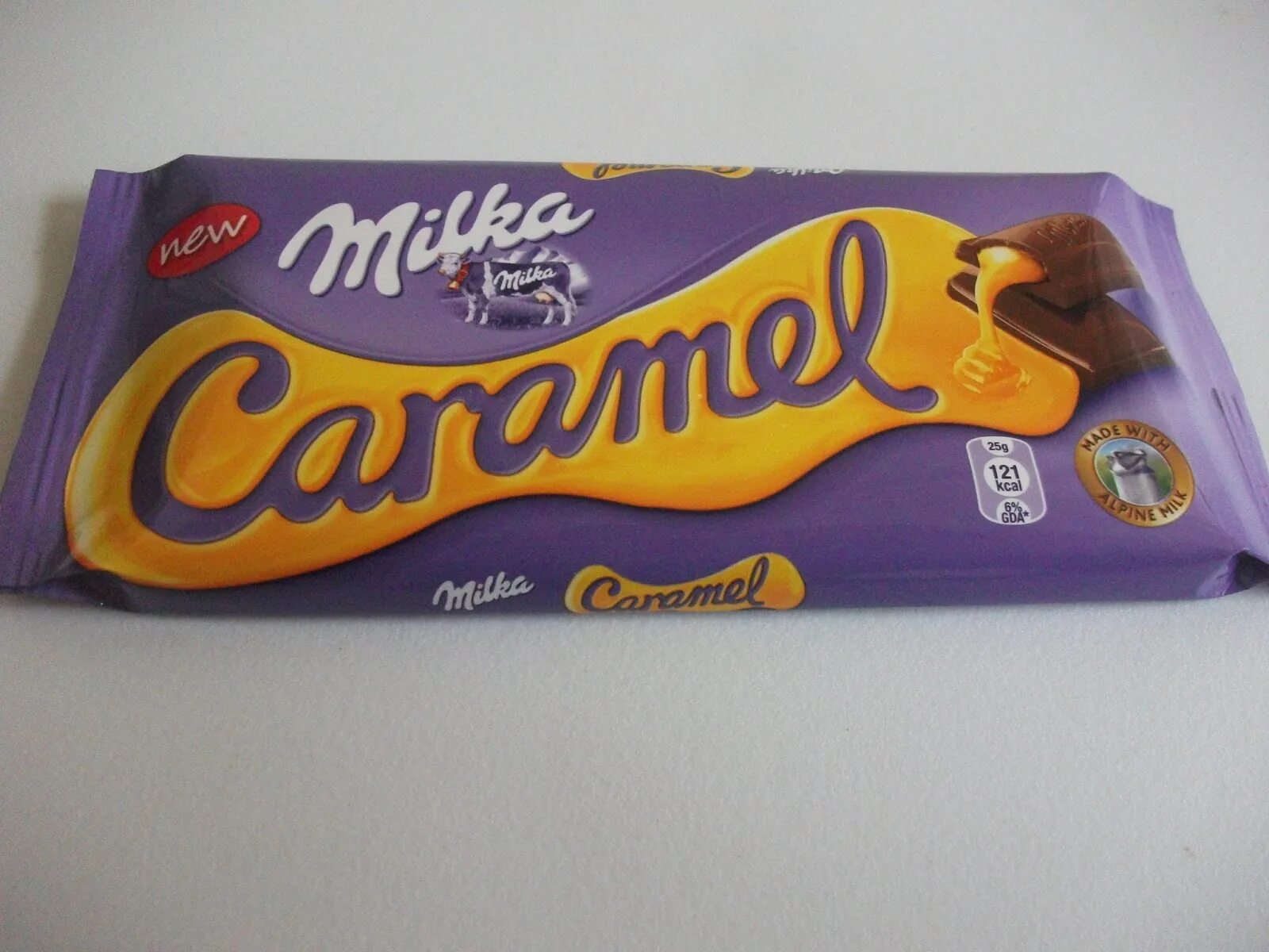 Milka jelly. Милка шоколад Crunch Caramel. Milka с карамелью. Милка Тоффи крем. Милка макси с карамелью.