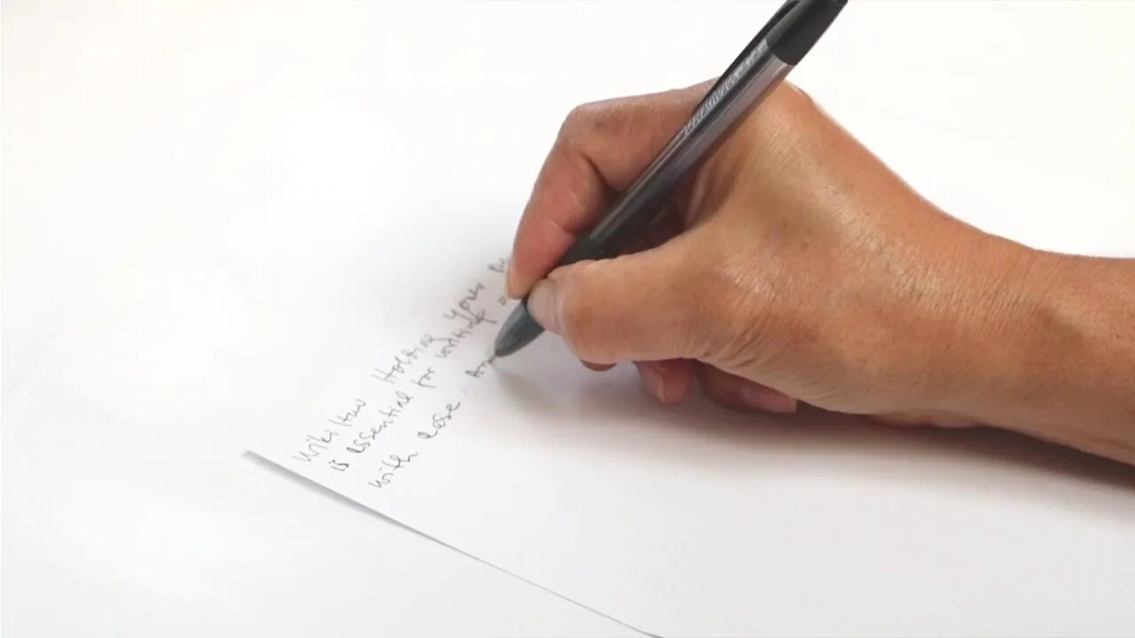 Written with a pen. Рука держит ручку. Write with a Pen. Пишущая рука на листе. Взять ручку со стола.