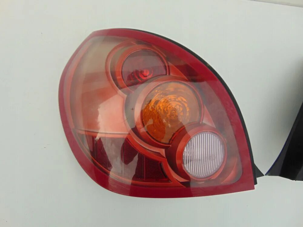 Стекло на фару ниссан альмера n16. Almera n16 задний фонарь внутренний. Фара задняя nissan almera n16. 215-19j9r-ue. Nissan almera n16 хэтчбек тюнинг задних фонарей.