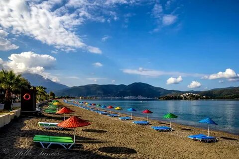 This year #Calis beach became even more bright with all those colorful umbr...