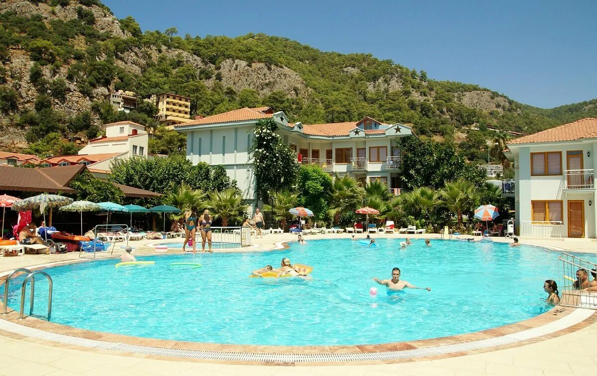 Дориан хотел. Дориан олюдениз турция. олюдениз turquoise hotel. олюдениз, belcekiz mevkii. dorian hotel 3 турция олюдениз.