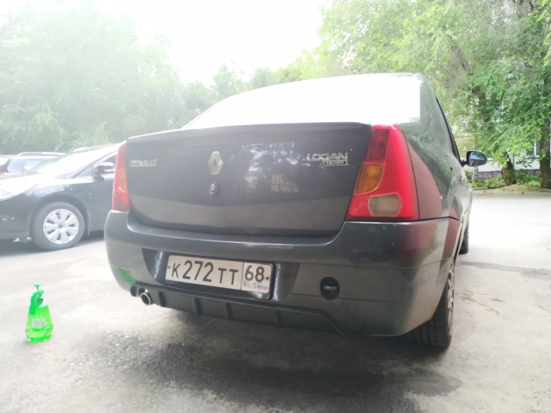 Задний бампер рено логан 1 рестайлинг. Renault logan задний диффузор. задний диффузор логан 1. диффузор на задний бампер логан 1. диффузор заднего бампера логан.