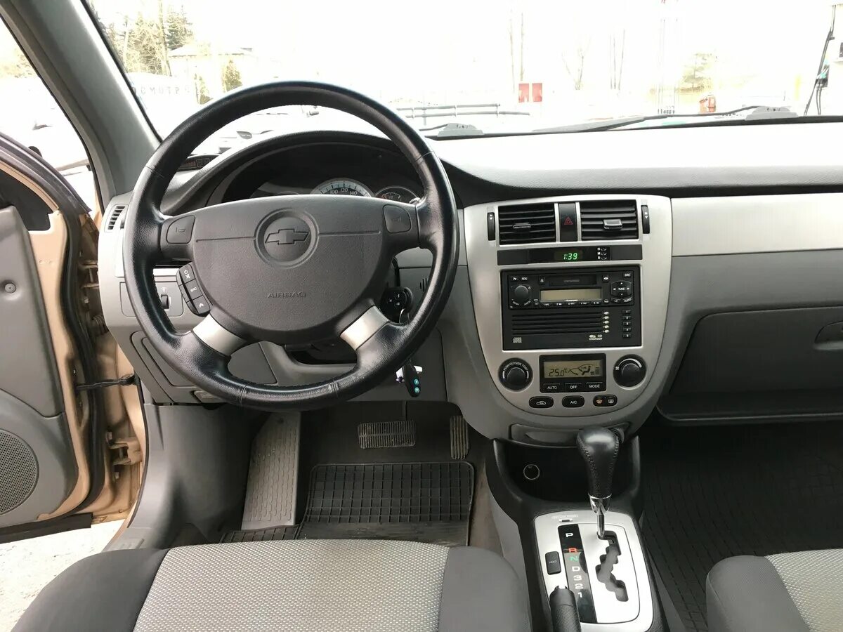 Лачетти универсал салон. Chevrolet Lacetti 2007 седан салон. Chevrolet Lacetti 2007 салон. Салон Шевроле Лачетти седан 2007. Лачетти универсал 2007 салон.