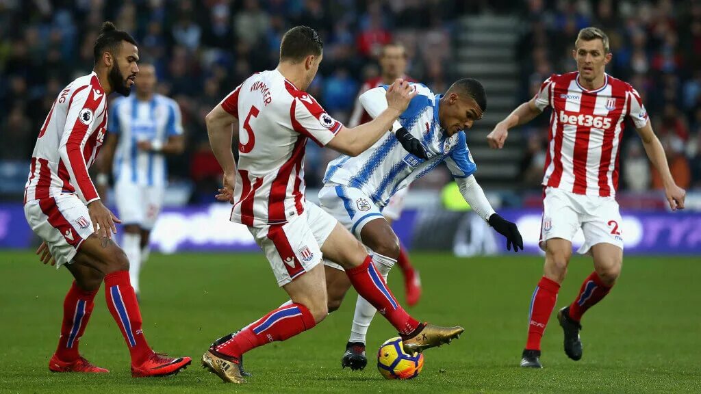 Матчи сток сити. Сток Сити vs Хаддерсфилд. Stoke City футбольная команда. Хаддерсфилд тренер. Wimmer Kevin.