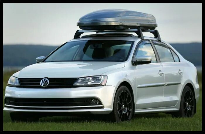 Багажник на крышу vw jetta 6. Thule багажник jetta 6. Багажник на фольксваген джетта 6. Автобокс на фольксваген джетта 6. Багажник на крышу шкода рапид 2020.