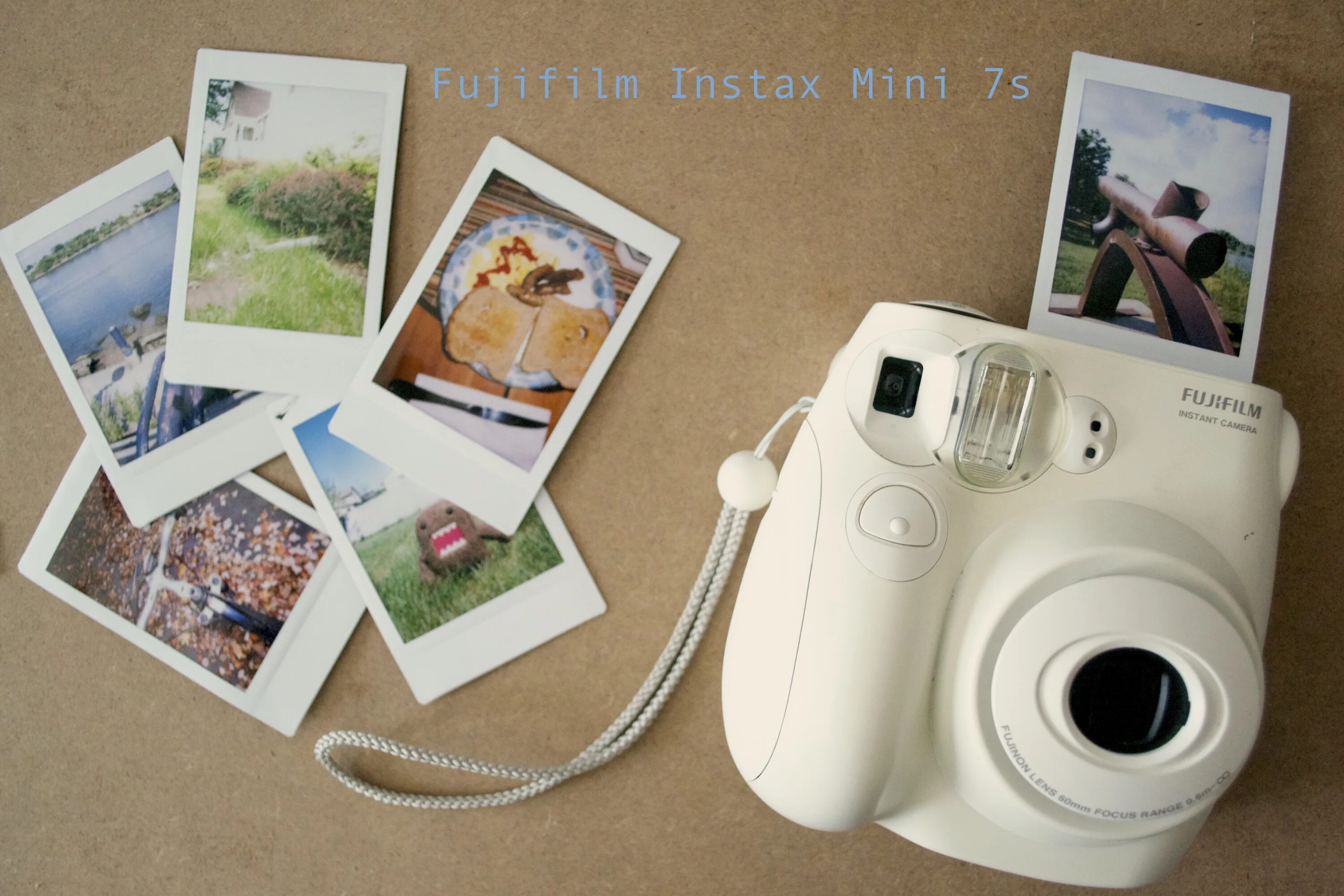 Почему фотографию называют фотографией. Полароид инстакс. Фотокарточки Polaroid Instax Mini. Фотоаппарат моментальной печати Polaroid Mint. Фотоаппарат Fujifilm Instax Mini 40 на столе.