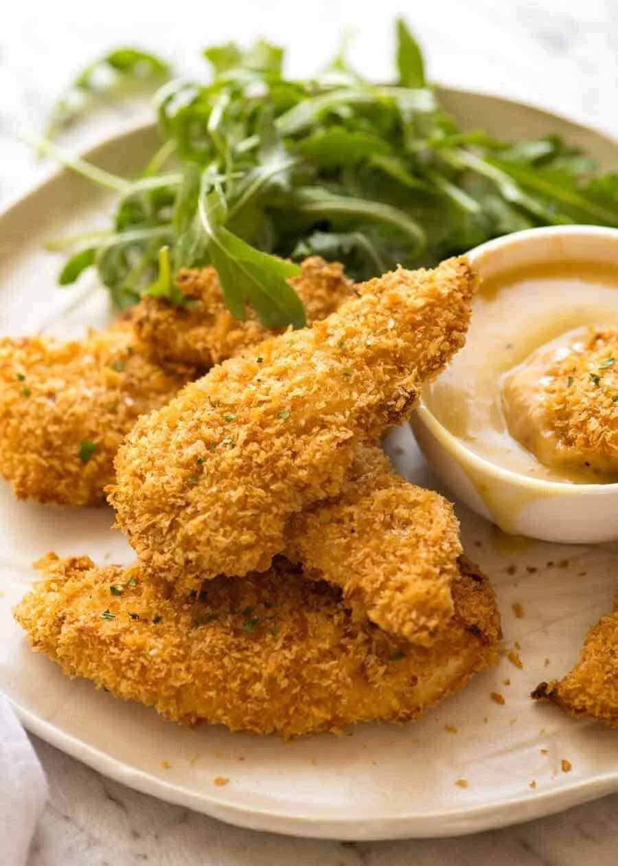 Куриные в сухарях. Чикен тендерс. чикен филе. курица в панировке. куриные в панировке.