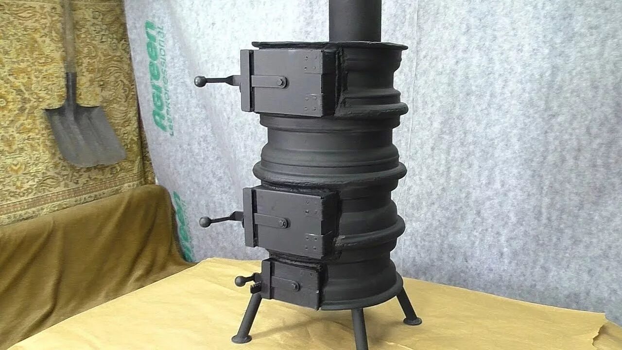 Печи для казанов из дисков. Печь буржуйка кулибин. печь для казана из колесных дисков р13. чудо печь буржуйка. буржуйка из дисков автомобиля.