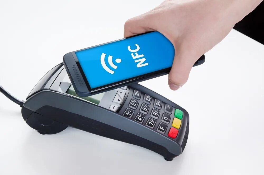 Платежи через мобильный телефон. Мобильная оплата. Кнопочный NFC. Оплачивает телефоном. Оплата смартфоном.