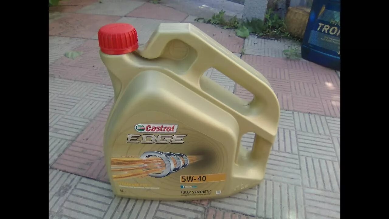 Кастрол Старая канистра. Castrol Edge 5w-40 ll 01 оригинал. Castrol Edge 5w-40 как отличить подделку. Масло кастрол оригинал