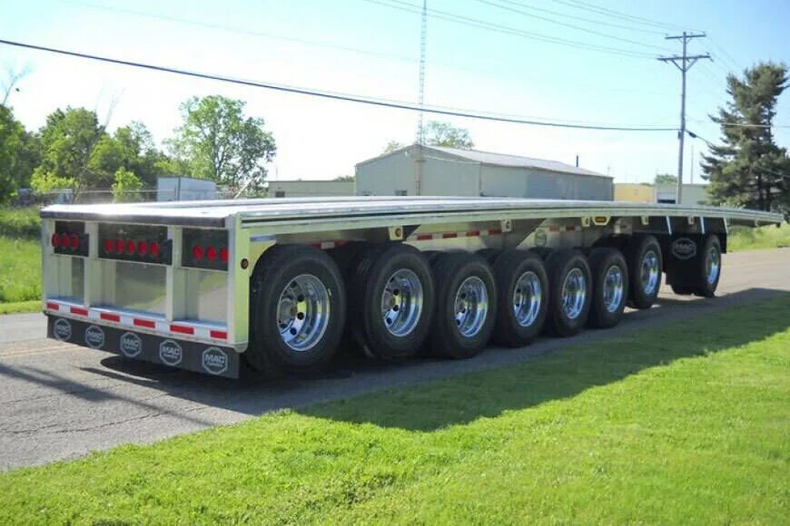 Флэтбэд прицеп американский. Американский полуприцеп flatbed. Полуприцеп флэт бэт американский флэтбэд. Flatbed trailer. Stacked flatbed.