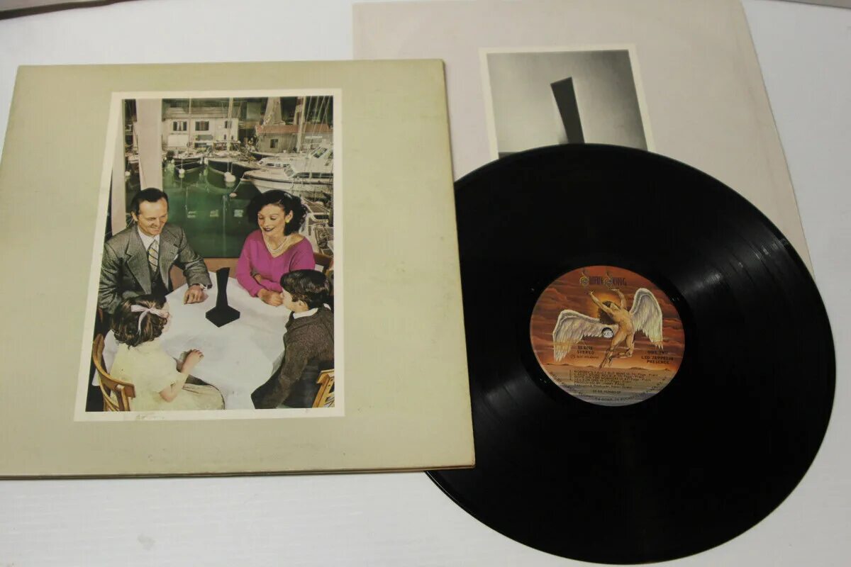 Альбом led. Led zeppelin presence 1976. led zeppelin presence album 1976. альбом лед зеппелин 1976. led zeppelin &quot;presence (lp)&quot;.