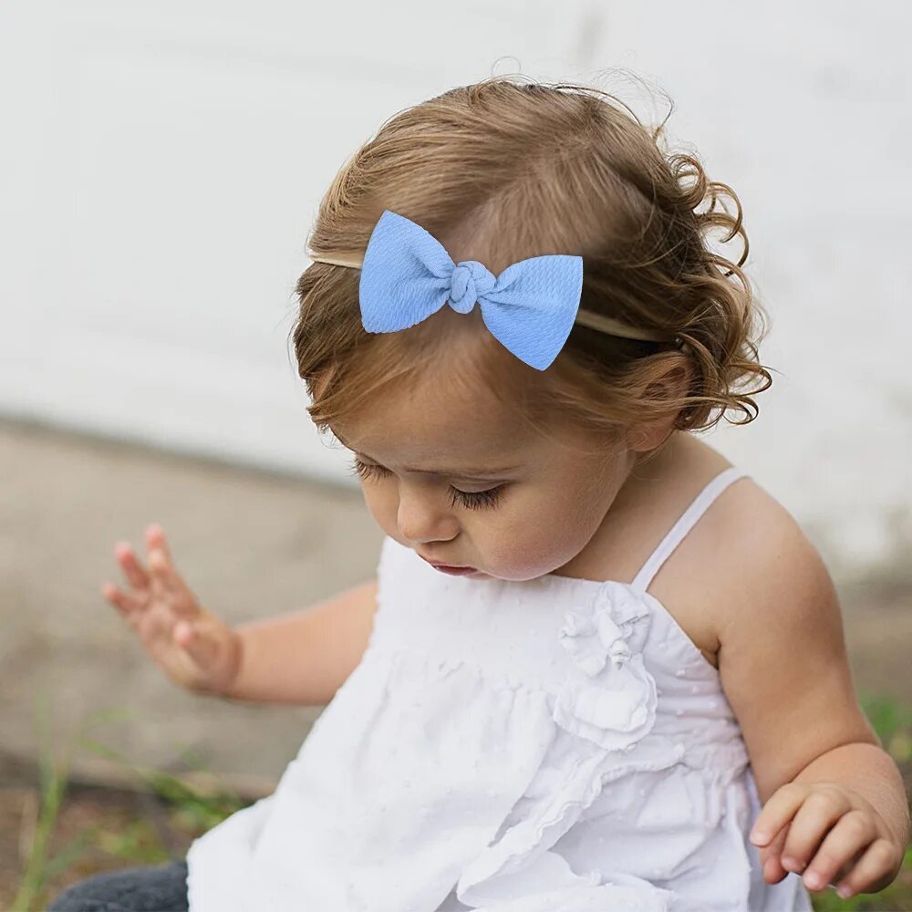 Бантики для девочек. Бант для волос. Повязка на голову для девочки. Девочка с бантиком. Девочка с бантиком.