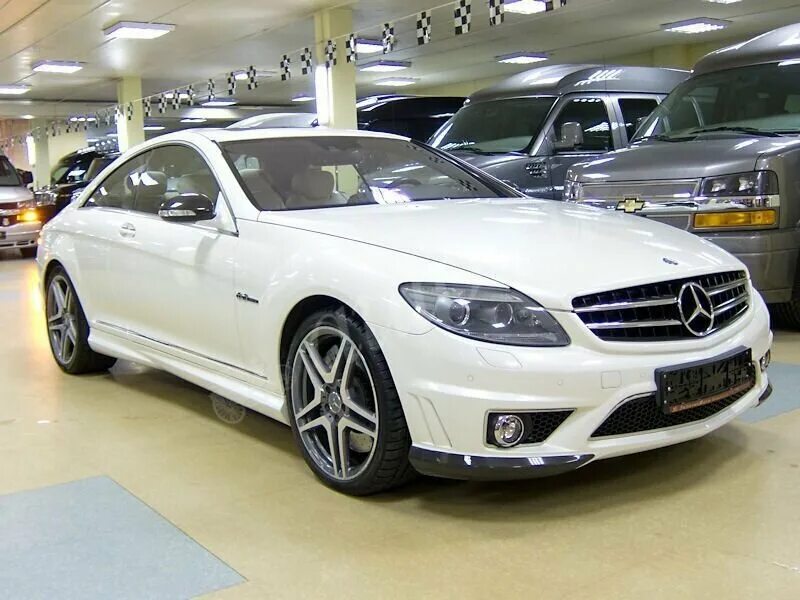 Купить мерседес без пробега. Cl63 AMG c216 белая. Mercedes-Benz CL-класс AMG c216. Мерседес CL 63 AMG белый. Mercedes-Benz CL-класс AMG 63 AMG II (c216).