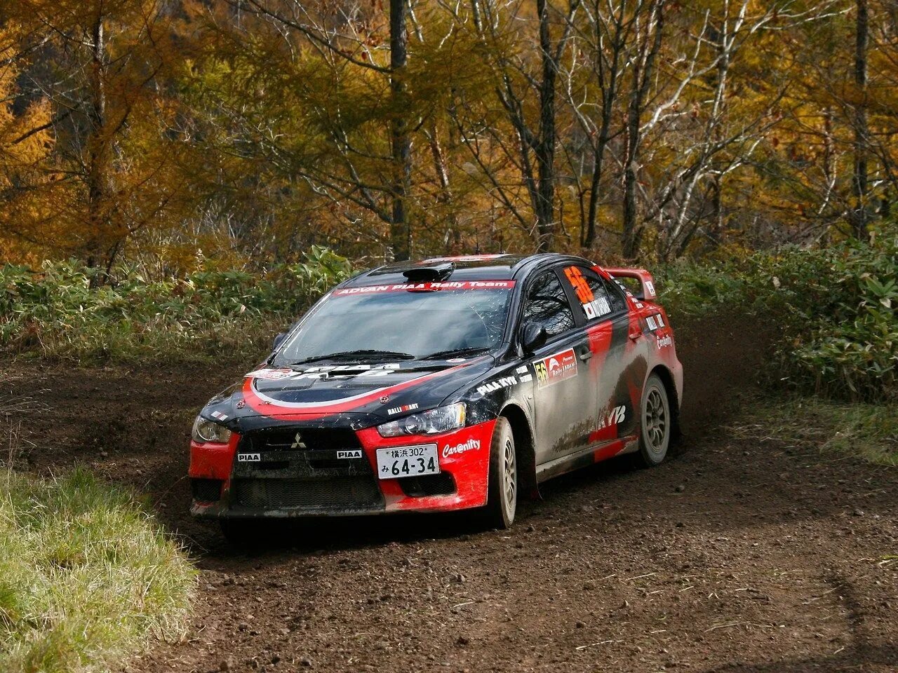 Ралли икс. Ралли Митсубиси Эволюшн 10. Митсубиси Лансер Эво 10 ралли. Mitsubishi EVO WRC Lancer 10. Mitsubishi Lancer Evolution 10 WRC.