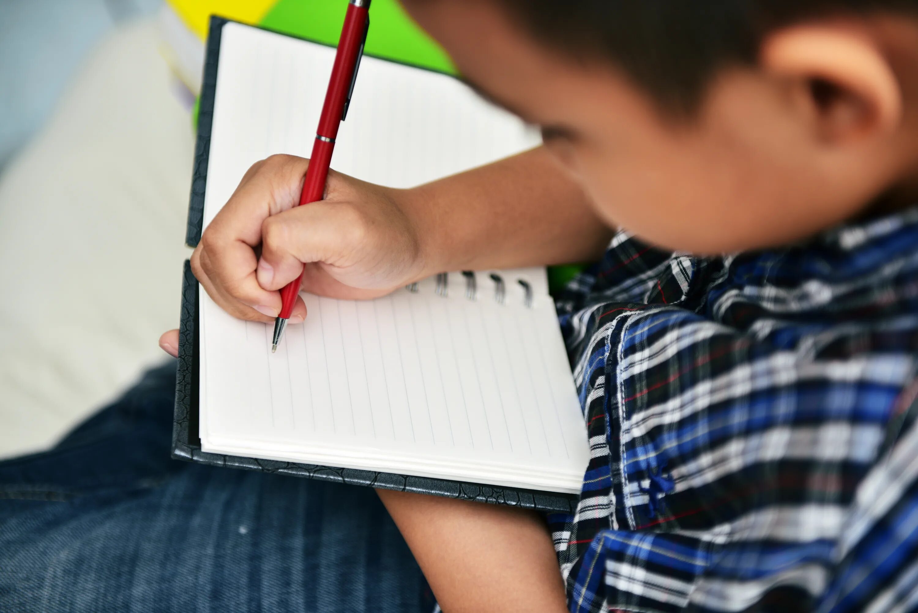 Teen here. Teenagers handwriting. Boy writing. Artist tears Journaling. Boy is writing a Diary.