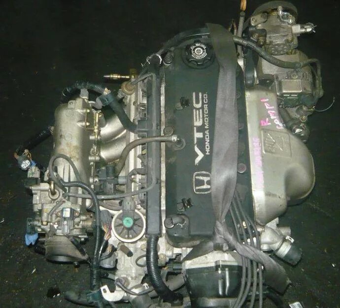 Honda f23a. Двигатель Хонда Одиссей f23a. Honda Odyssey ra3 ДВС. Двигатель Хонда Одиссей f22b.
