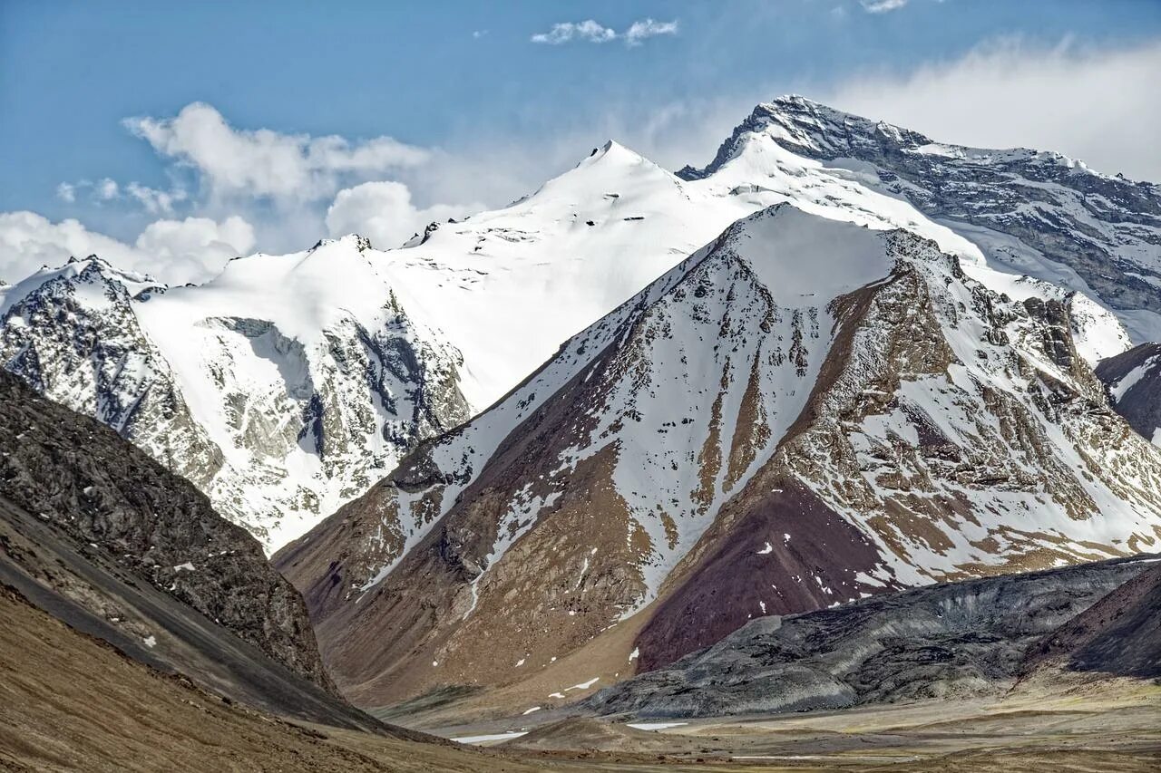 Grand pamir. Горный Бадахшан Памир. Горы Памира в Таджикистане. Плоскогорье Памира. Памир Бадахшан люди.