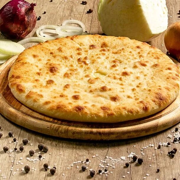 достоевский осетинские пироги. осетинский пирог из достоевского. пирог достоевский. вино и осетинский пирог. доска для осетинских пирогов.