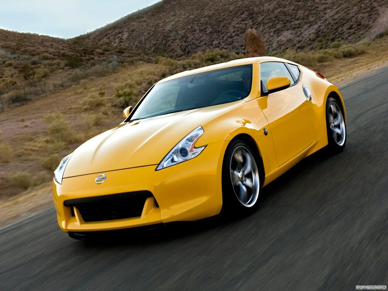 Просто машина купить. Nissan 370z us-spec cars Coupe 2009. Nissan 370z. Ниссан 370z оранжевый. 2010 Nissan 370z.