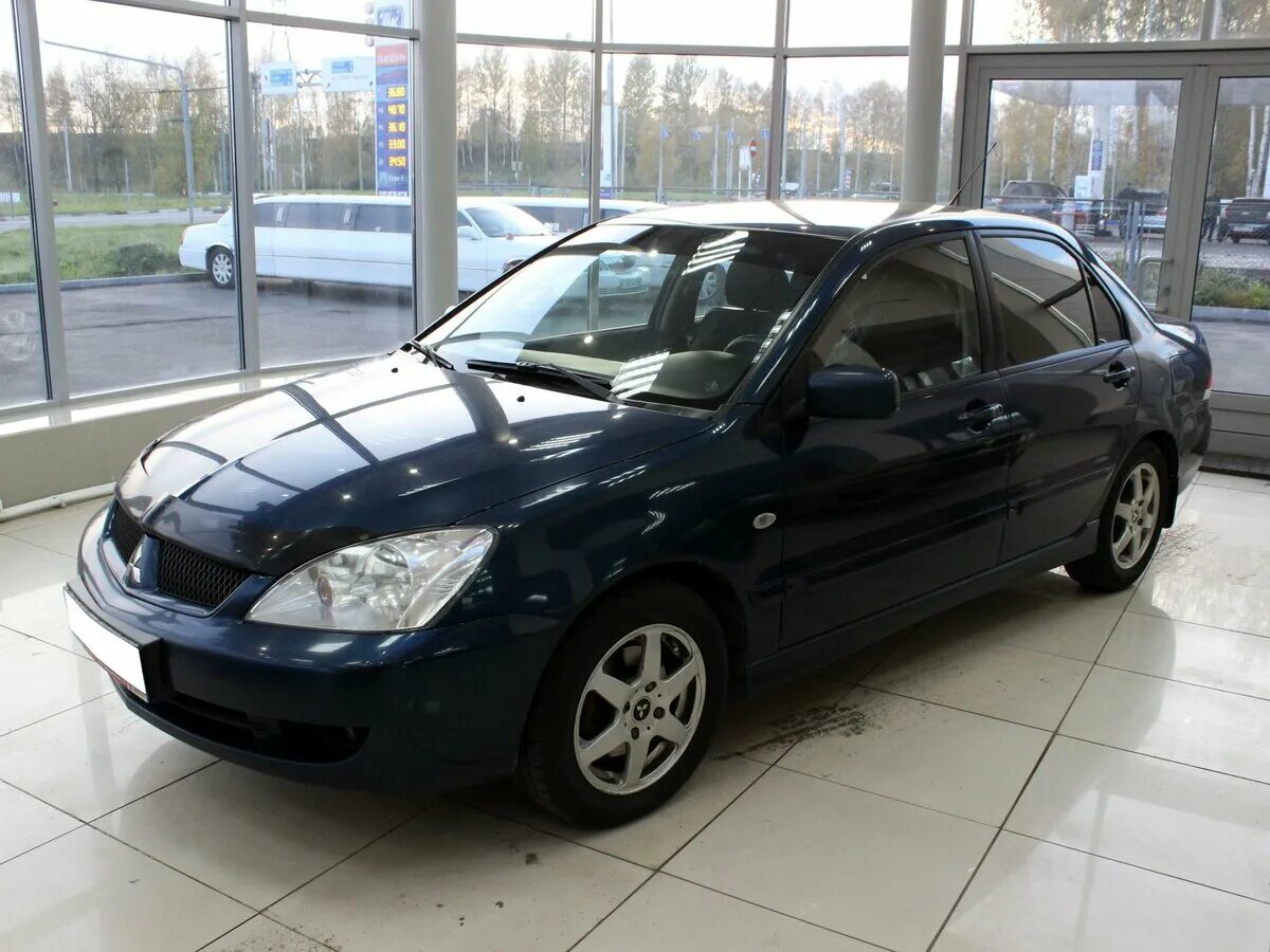 Mitsubishi lancer 2005. Mitsubishi Lancer 9 2005. Mitsubishi Lancer 1.6 МТ 2005. Лансер 9 седан 2005. Митсубиси Лансер 9 2005 года.