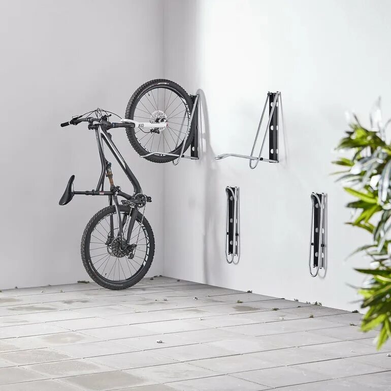 Велосипеды стен купить. Велопарковка настенная esse rc1815b. Вешалка для велосипеда на стену. Хранение велосипедов. Система хранения велосипедов.