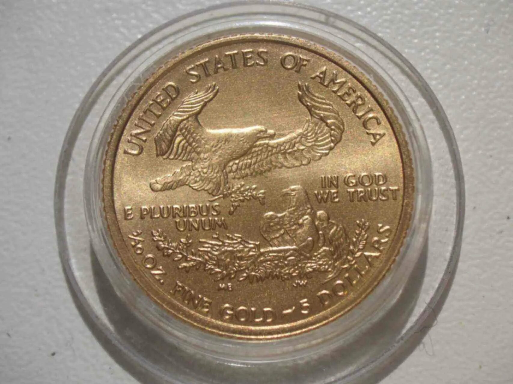 Орел на монете. Монета Золотая 1583 с орлом. Орёл монета золото. Новый золотой Орел монета. 5 долларов золото