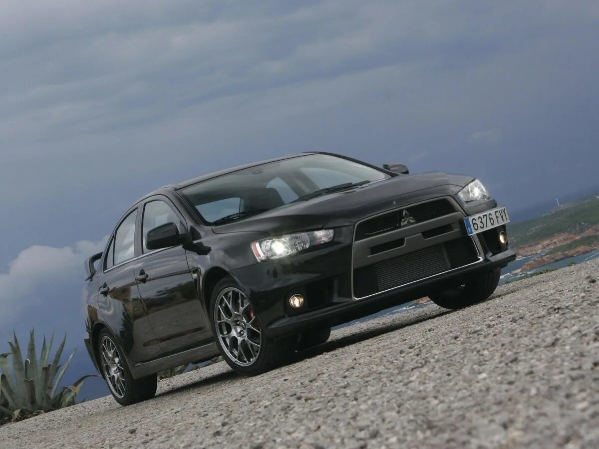 Lancer 10 2008. Mitsubishi Lancer EVO 2007. Мицубиси Эволюшн 10. Mitsubishi Lancer EVO 10. Mitsubishi Lancer Evolution x 2008.