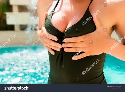 Sexy Girl Swimsuit Squeezes Her Wet Stock Photo (Edit Now) 1104467027.