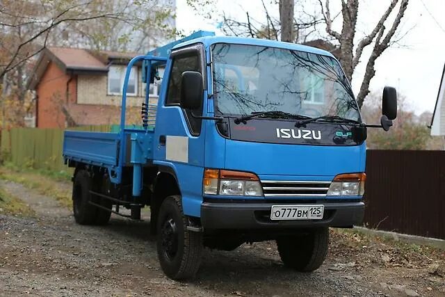 Исузу 4вд. Isuzu elf 1990 грузовой самосвал. Исузу эльф на мостах газ 66. Isuzu elf 4x4 двухкабинник. Исузу 4вд.