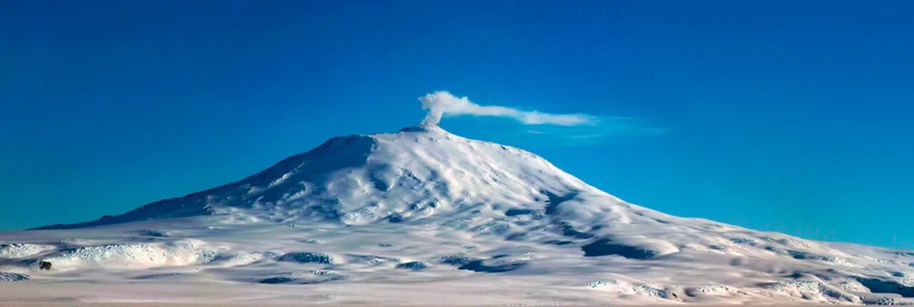 Вулкан Эребус в Антарктиде. Гора Эребус Антарктида. Вулкан гора Эребус Антарктида. Антарктида фото гора Эребус.