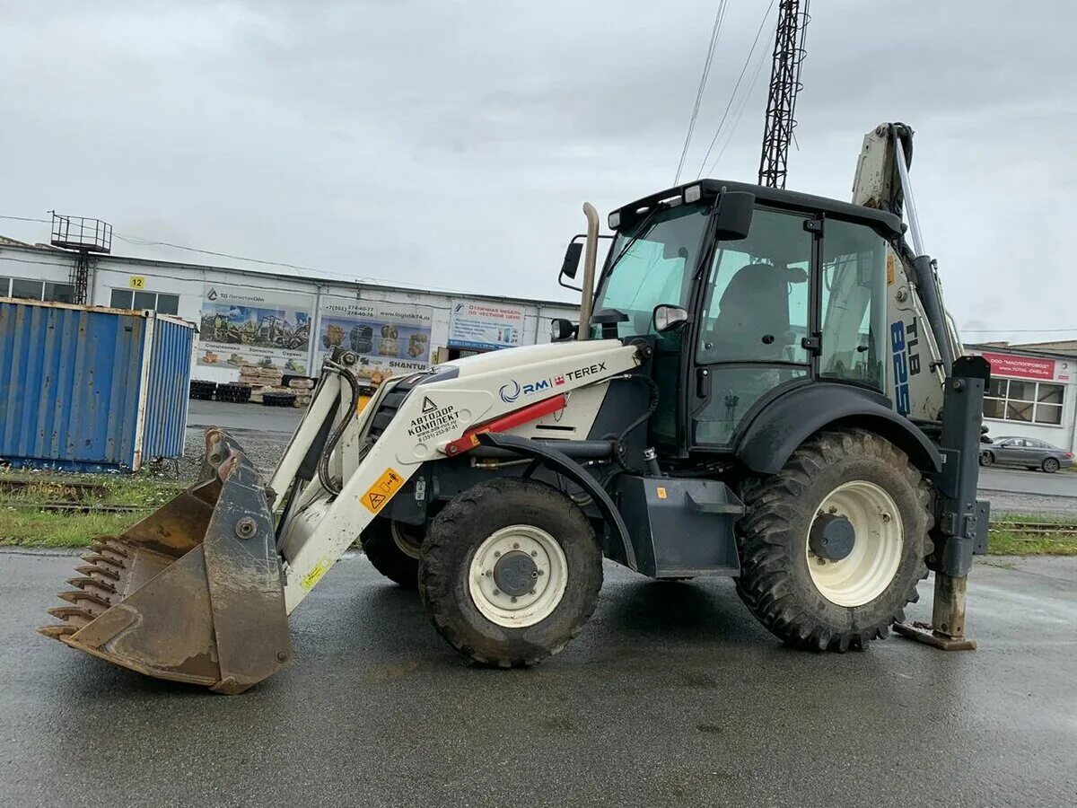 7 t3. Экскаватор-погрузчик tlb 825. Экскаватор-погрузчик terex 860. Экскаватор погрузчик терех 860. Трактор погрузчик терекс.