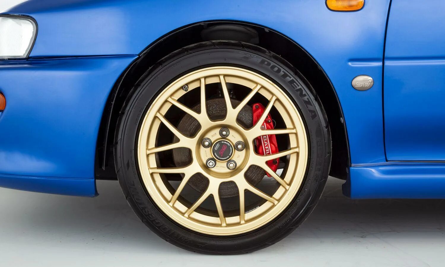 Subaru impreza 1999. Субару колеса 17. Диски субару wrx r17. Колеса 215 55 r17 на субару импреза. Резина импреза.