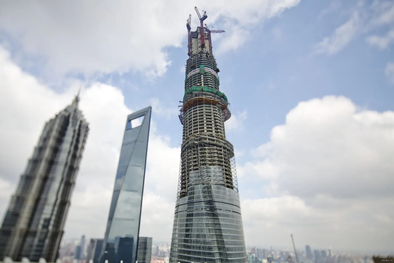 Шанхайская башня (Shanghai Tower). Башня в Шанхае 650 метров. Шанхайская башня 632 метра. Шанхай Тауэр высота. Вертикальная башня высотой