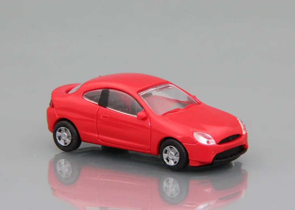 Автомобили 1 32. Модель 1/32 Ford Puma 4632. 1/32 Ford Puma 4621 модель. Модель машины Пума. Монетница Форд Пума.