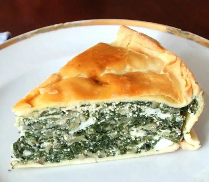 Pie with Spinach and Cheese with a Fork on a Board Stock Image - Image of backgr