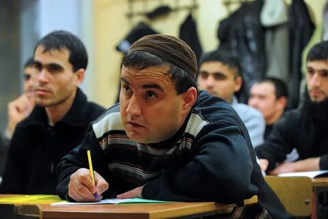 Лица мигрантов