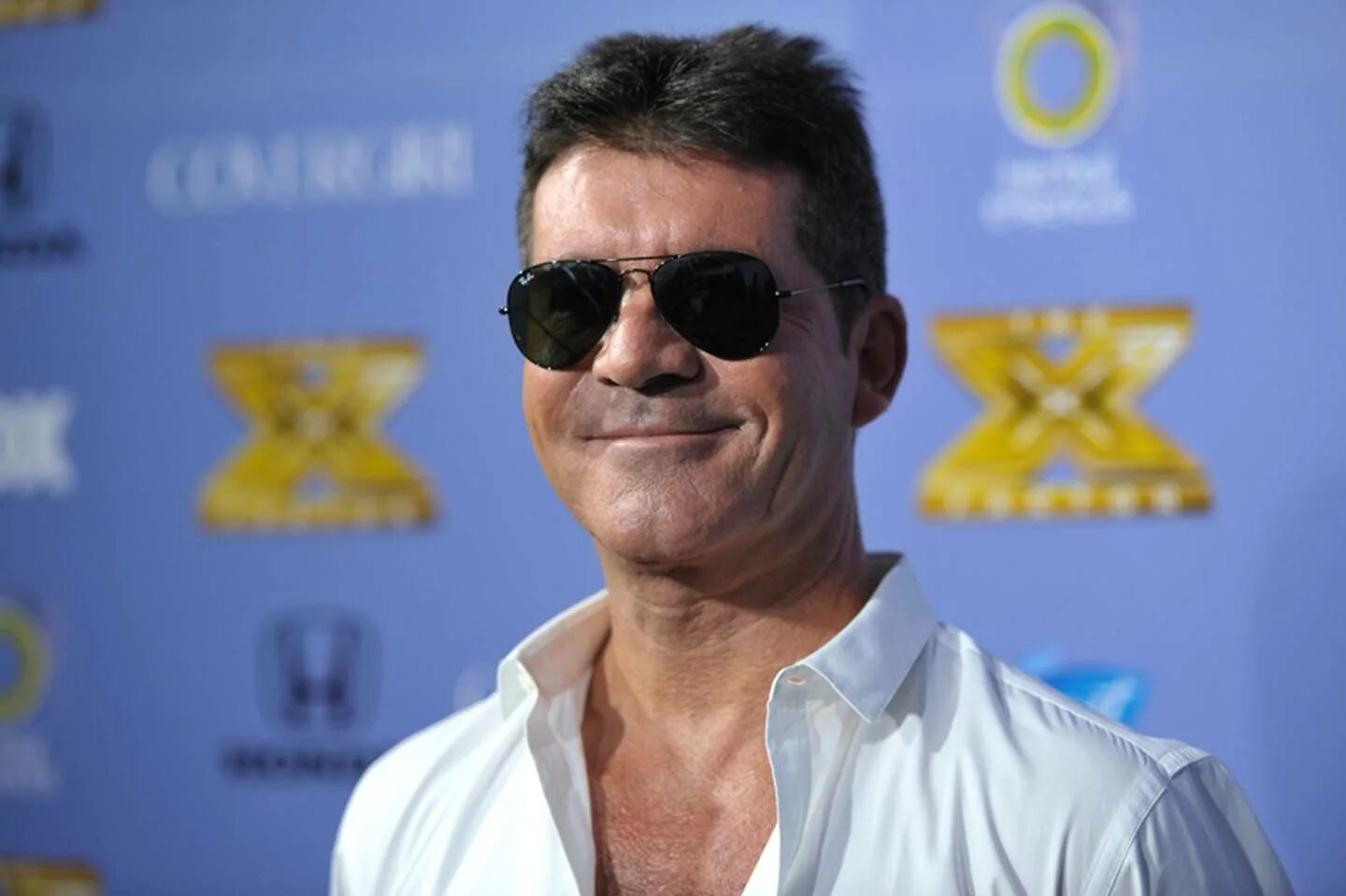 Simon cowell. Simon Cowell 2022. Simon Cowell 2010. Саймон Коуэлл британский телеведущий 2023.