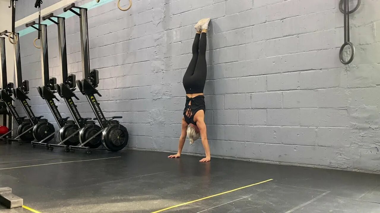 Wall Handstand hold. Wall walk. Sarah Barrow Handstand. Flea Handstand walk. G ngsta walk