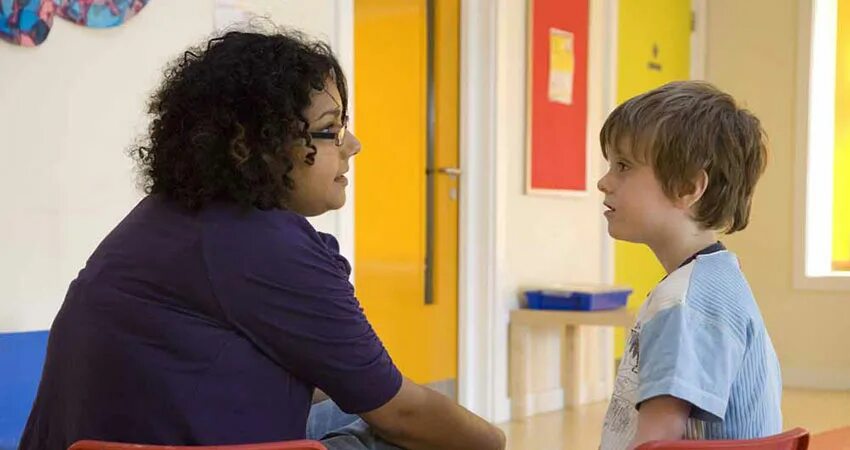 Psychology in the classroom. Can talk school. Can talk school. Can talk school. Two boys talking.