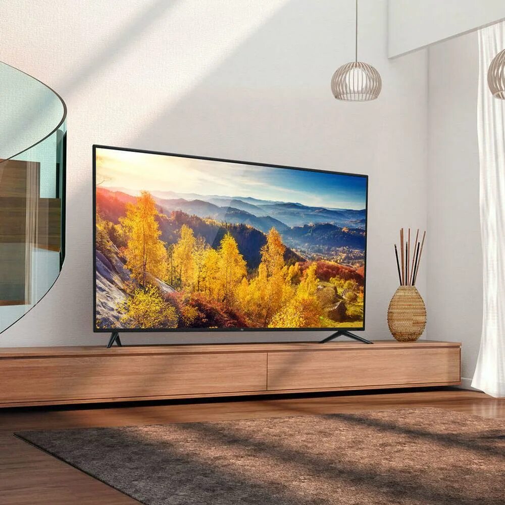 Лучшие телевизоры сяоми. Телевизор Xiaomi mi TV 4s 50. Xiaomi mi TV 4c 40. Телевизор 75 дюймов. Телевизор Сяоми в интерьере.