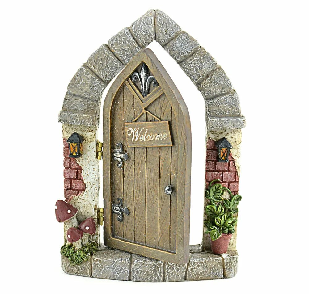 Сказочная дверь в саду. Двери для фей и гномиков. Дверцы для фей в доме Ирландия. Домик велком на дверь.