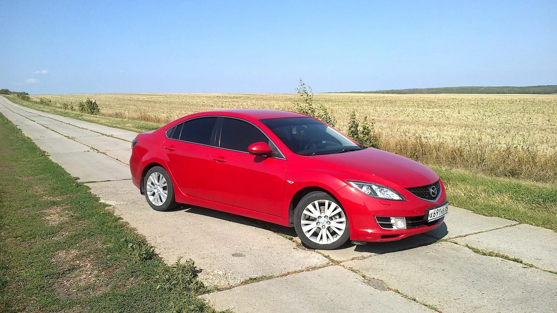 Тест мазды 6. Mazda 6 Red. Мазда 6 красная. Мазда 6 красная седан. Мазда 6 2009 красная.