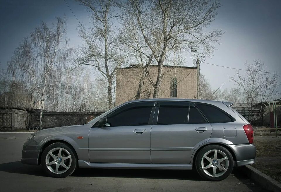 Мазда фамилия диски. Mazda familia r15. Mazda familia s-wagon диски r16. Мазда фамилия на дисках. Мазда фамилия на дисках.