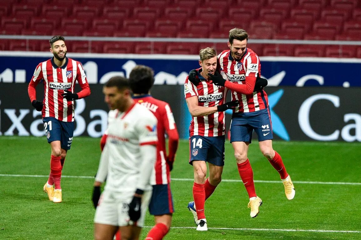 Севилья атлетико мадрид. Atletico madrid champions. Атлетико мадрид. Атлетико мадрид афты. Джеффри кондогбия атлетико мадрид.